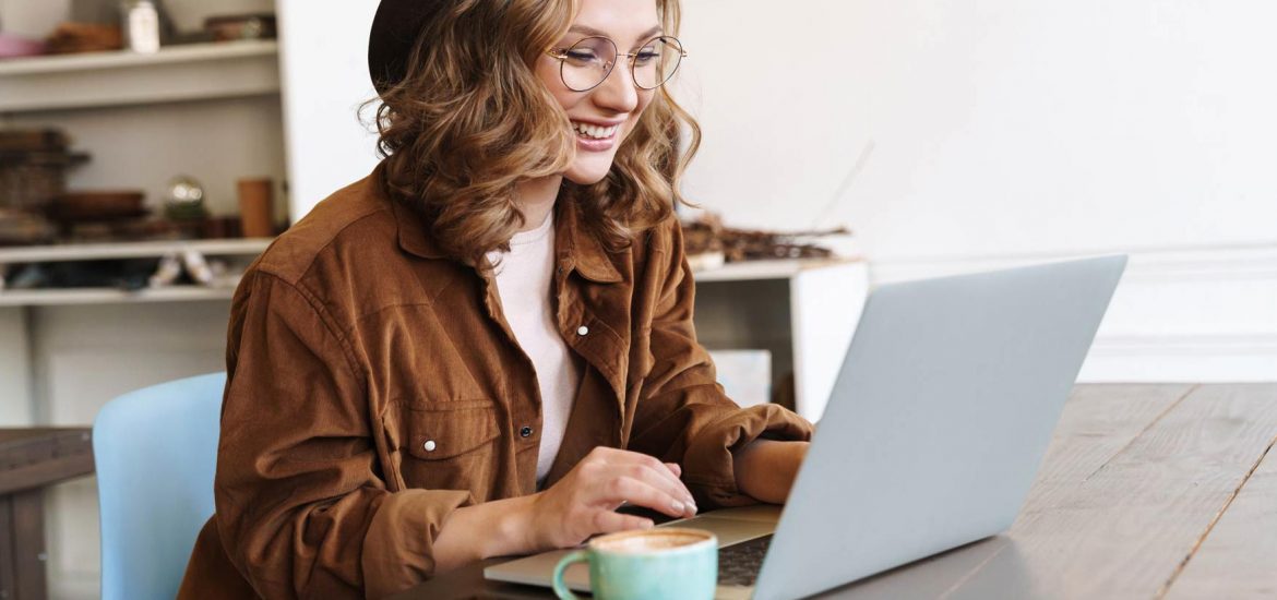 image-of-cheerful-woman-working-with-laptop-while-CNX4RJP.jpg image-of-cheerful-woman-working-with-laptop-while-CNX4RJP.jpg